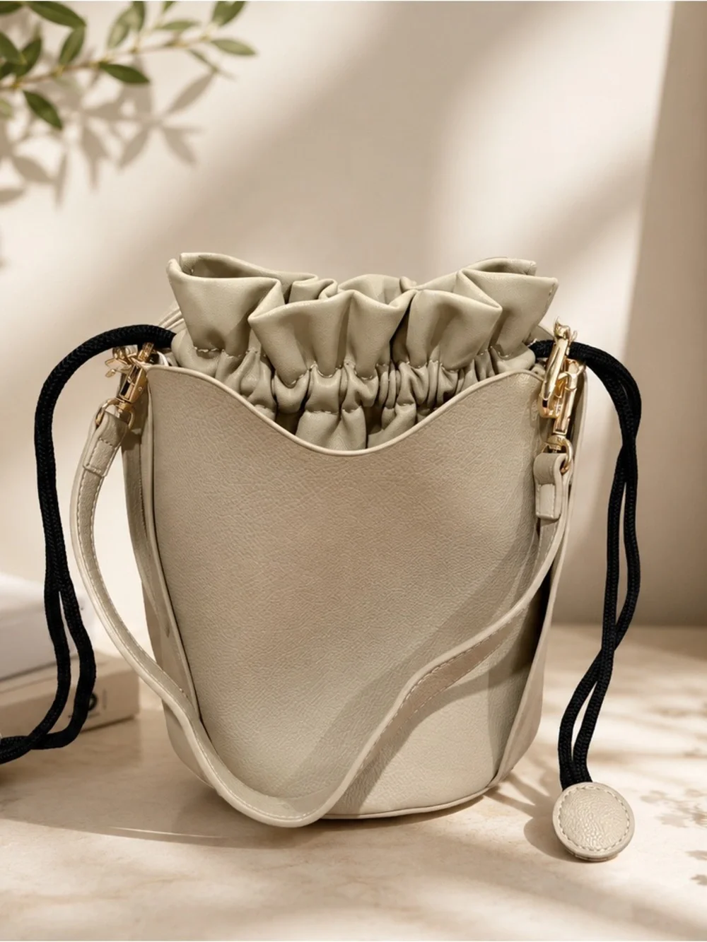 Minimalist Cream Bucket Bag with Drawstring Closure